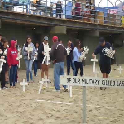 Placing the crosses of those teenagers who have died in Post 9/11 wars